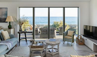View of the sea from inside the open plan living area of Curlews
