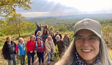 A group of walkers surrounded by scenery