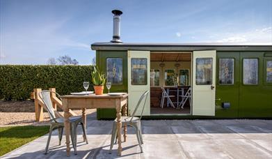 The Lowe Commotion exterior with outdoor furniture