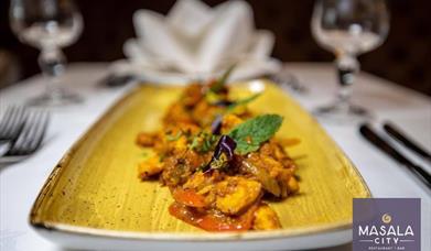 Food on a table at Masala City