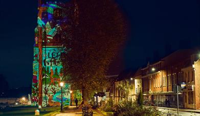 Chichester Cathedral bell tower lit for Let it Glow Christmas 2025